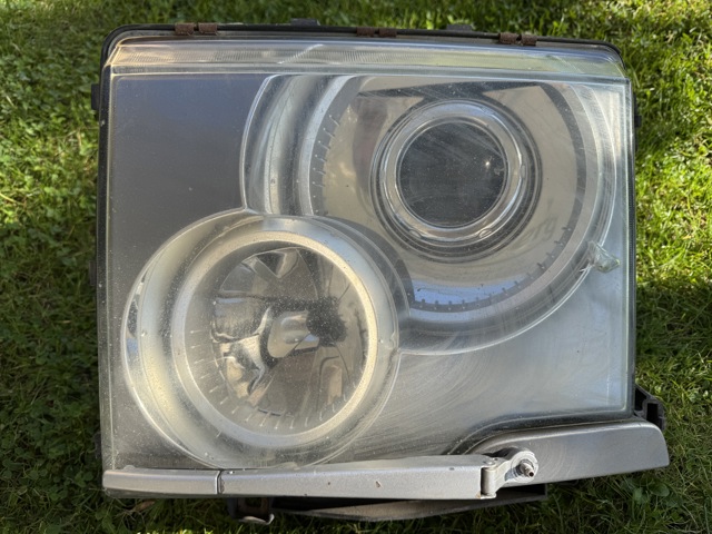 Фара левая XBC001310 LAND ROVER