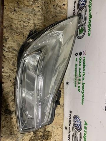 Вставка фары правой 13226781 OPEL