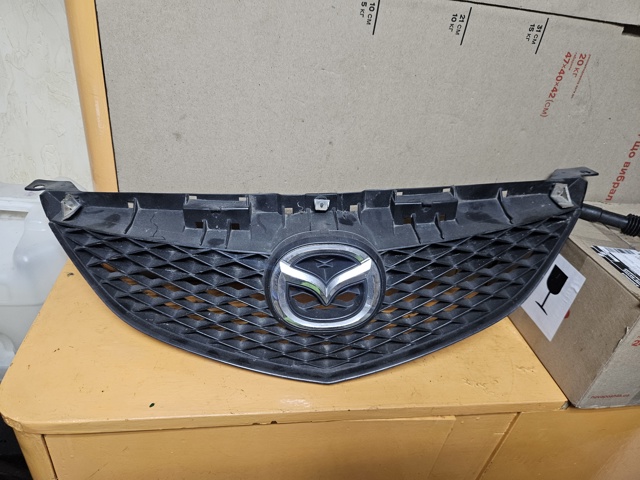 Облицовка радиатора GJ6A50712 MAZDA
