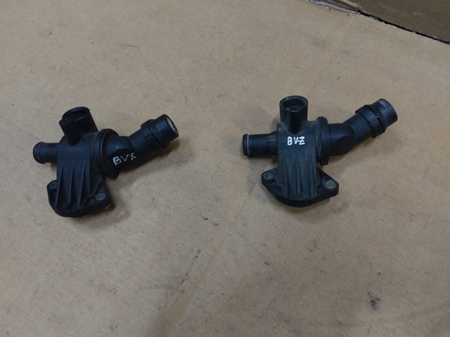 Термостат в сборе 06F121111G VAG