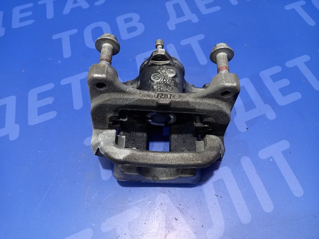 Суппорт тормозной задний правый 13515118 GM
