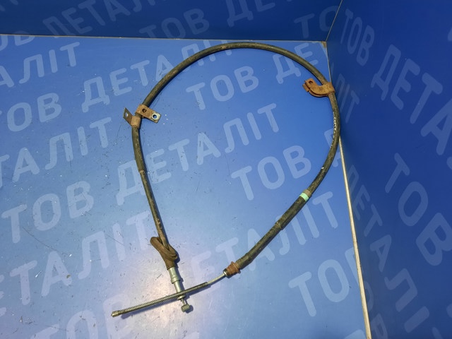Трос ручного тормоза задний 26051SA010 SUBARU