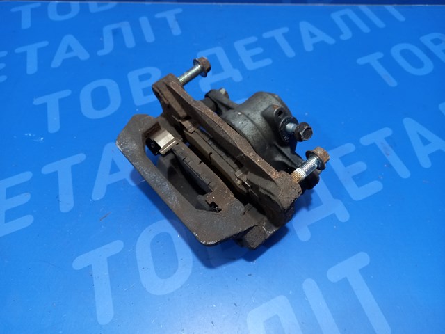 Тормозной суппорт задний левый 26692SG010 SUBARU