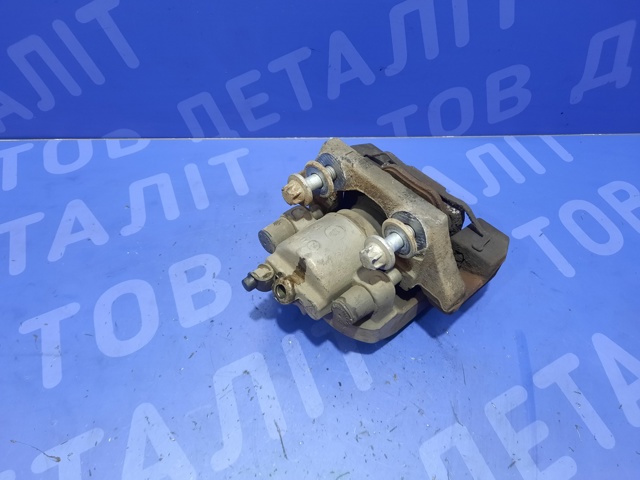 Тормозной суппорт задний левый 34216776787 BMW