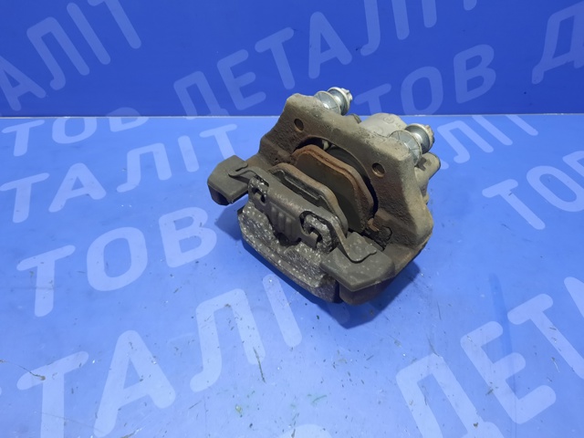 34216776787 BMW Суппорт тормозной задний левый купить в Ирпень