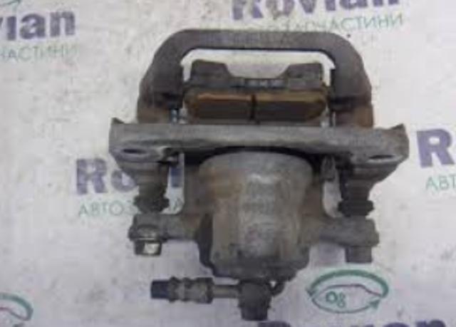 Тормозной суппорт задний левый 440113NK0A NISSAN