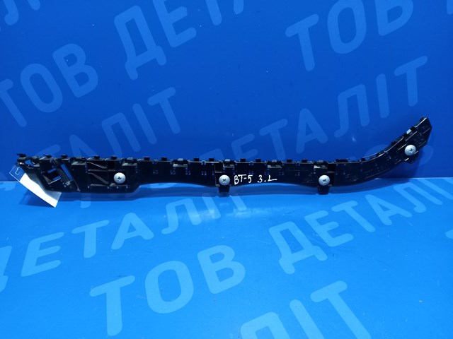 Кронштейн бампера заднего, внешний левый 57707AN35A SUBARU