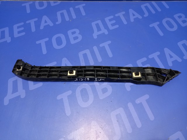 Кронштейн бампера заднего, внешний левый 57707SG090 SUBARU