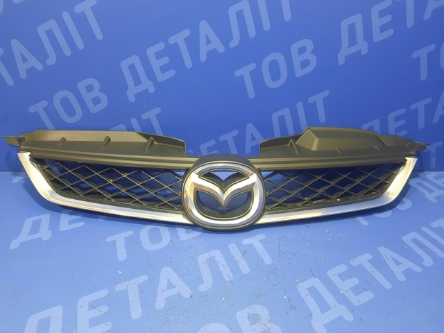 Облицовка радиатора C23550710C MAZDA