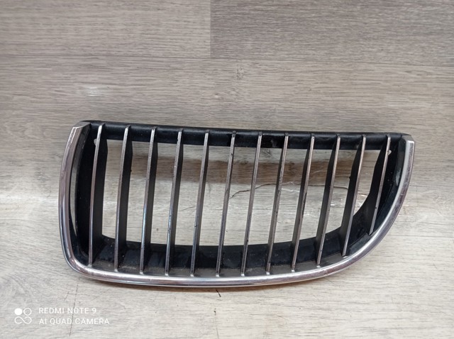 Решетка радиатора левая 7120009 BMW