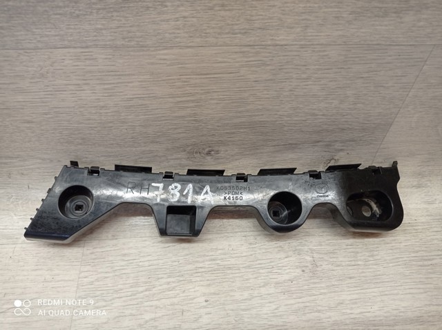 Кронштейн бампера заднего, внешний правый KD53502H1 MAZDA