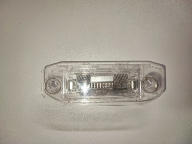 Фонарь освещения номерного знака 31253006 VOLVO