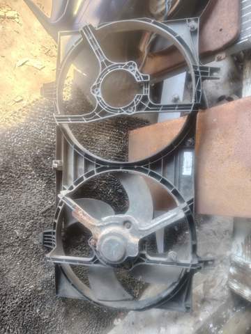 Диффузор радиатора охлаждения в сборе с мотором 21481BM410 NISSAN