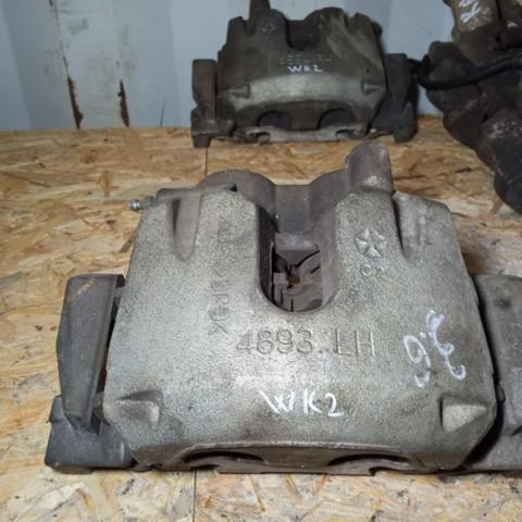 Суппорт тормозной, передний, левый 68138843AA CHRYSLER