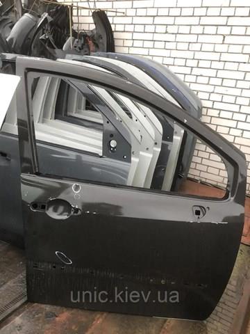 Пассажирская передняя дверь 7751475518 RENAULT