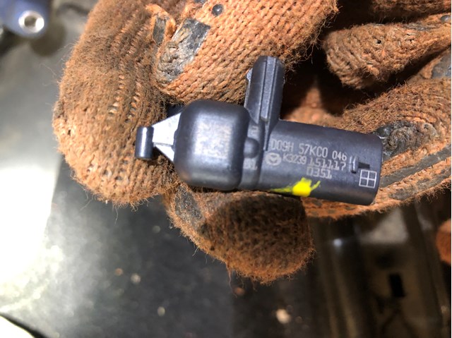 Датчик AIRBAG передний D09H57KC0 MAZDA