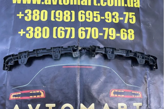 TESLA 105506900E Кронштейн решетки радиатора в наличии Каменское