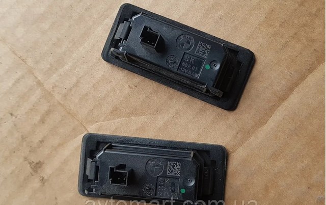 7193293 BMW Фонарь подсветки заднего номерного знака купить в Днепр