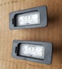 Фонарь освещения номерного знака 7193293 BMW