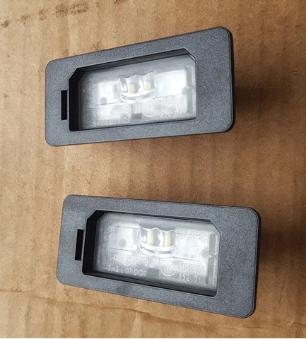 7193293 BMW Фонарь подсветки заднего номерного знака купить в Черкассы