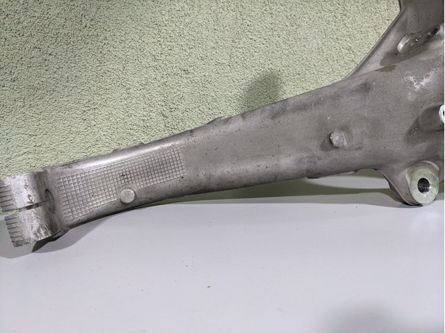 104431600E Tesla Model Цапфа (поворотный кулак) передний правый купить в Сумы