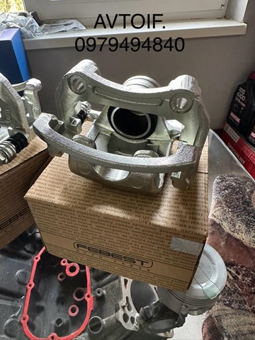 NISSAN 4401105J00 Суппорт задний левый в наличии Ужгород
