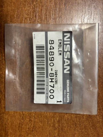 848908H700 NISSAN Эмблема крышки багажника (фирменный значок) купить в Полтава