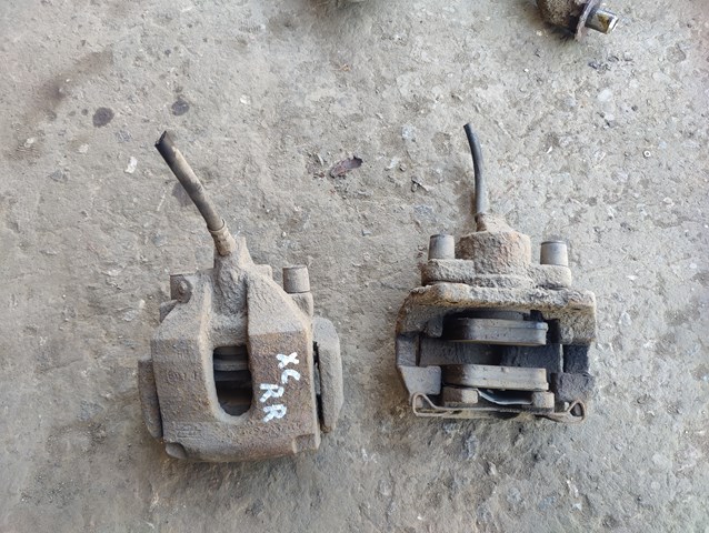 Тормозной суппорт задний левый Volvo XC90