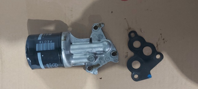  Корпус масляного фильтра PE0114311 MAZDA
