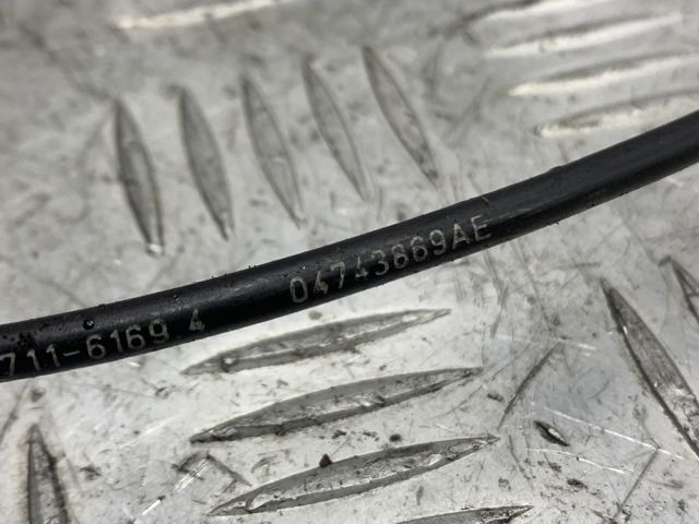 Датчик АБС (ABS) задний, левый 04743869AE CHRYSLER