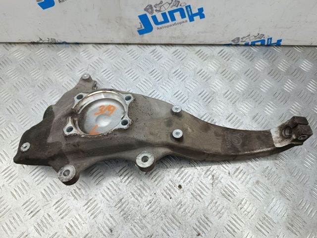 Цапфа поворотная левая 31216775767 BMW