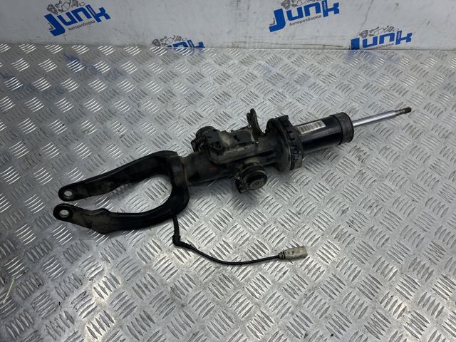 Амортизатор передний левый 37116851127 BMW