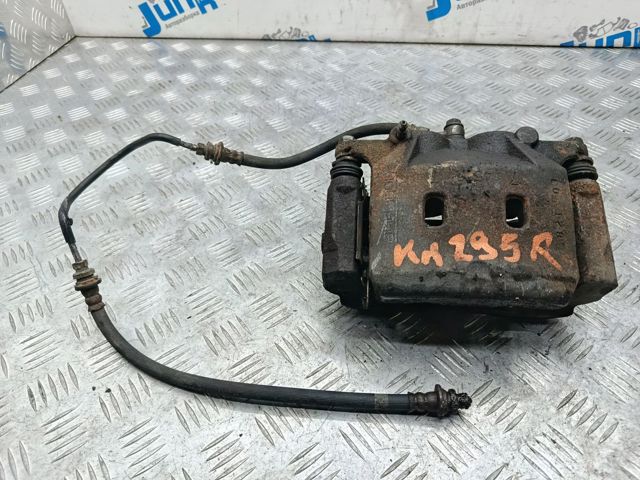 Суппорт тормозной, передний, правый 410014GS0A NISSAN