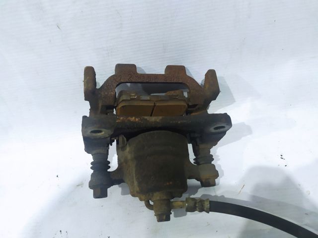 NISSAN 440011AA0A Суппорт тормозной задний правый в наличии Винница