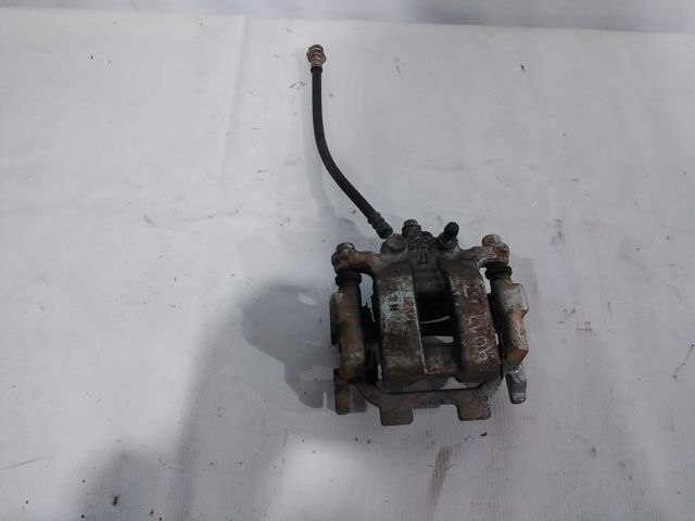 Суппорт тормозной левый задний 440111AA0A NISSAN