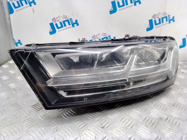 Фара левая 4M0941773B VAG