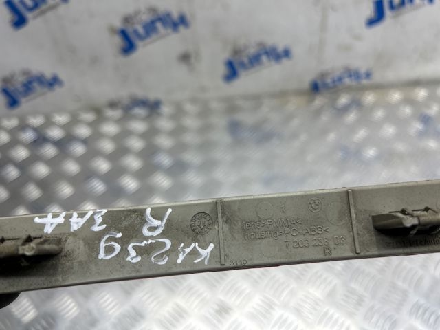 Правый отражатель бампера 63147203238 BMW