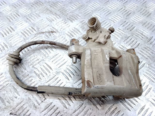 Тормозной суппорт задний левый Форд Фокус 3