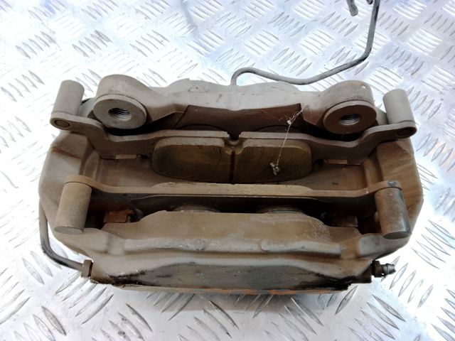 Суппорт тормозной, передний, левый 8W0615107C VAG
