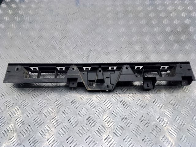 Левый кронштейн крепления бампера заднего 97050564101 VAG