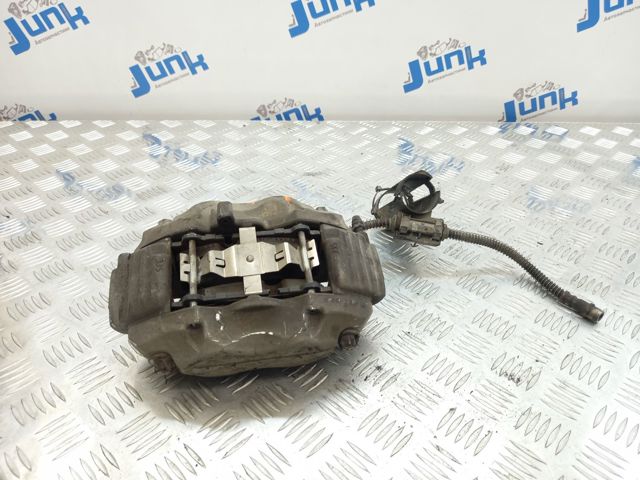 Суппорт тормозной, передний, правый A0034205283 MERCEDES