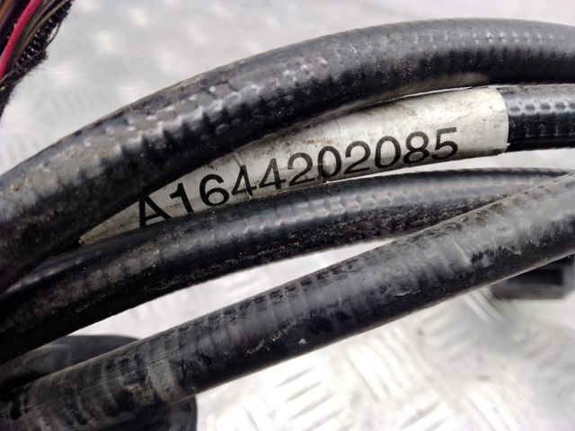 Трос ручника передний A1644202085 MERCEDES