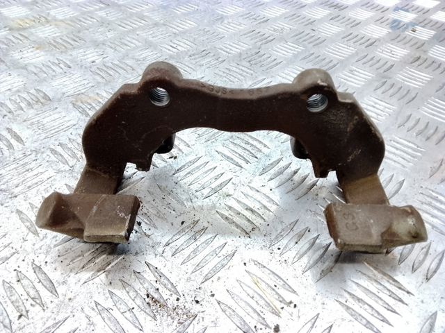 Скоба переднего суппорта AV6Z2B292C FORD