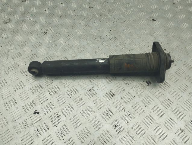 Задний амортизатор E62101AA0C NISSAN