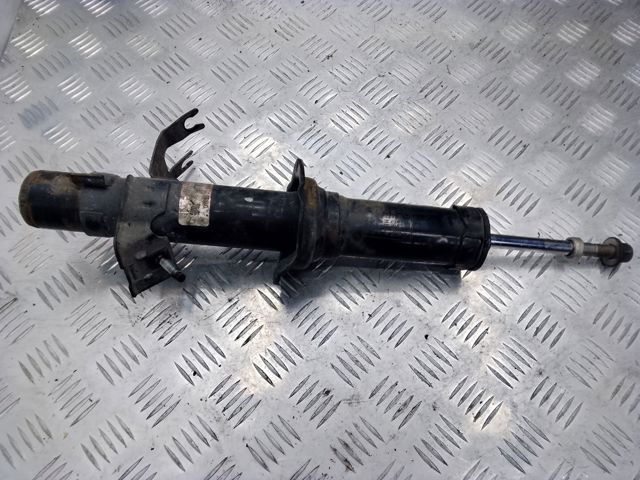 Амортизатор передний E6A111CB0C NISSAN