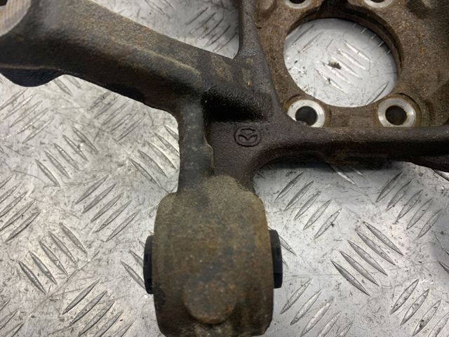 Цапфа поворотного кулака GHR12611XB MAZDA