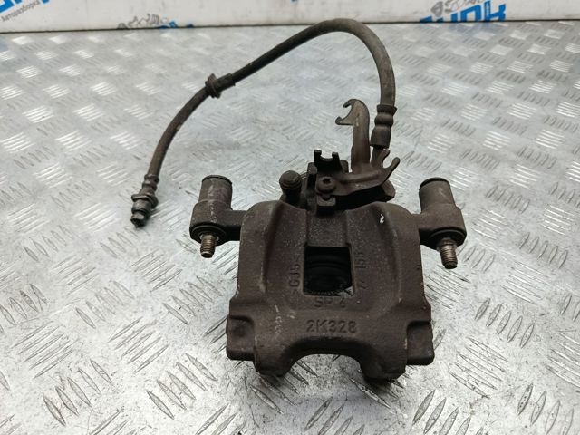 Суппорт тормозной левый задний LR061381 LAND ROVER