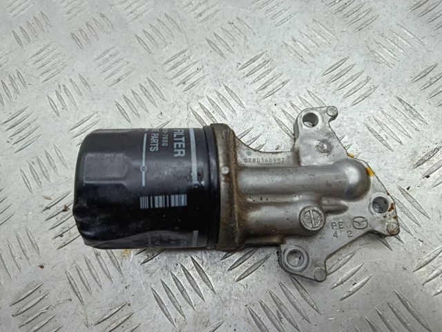  Корпус масляного фильтра PE0114311 MAZDA