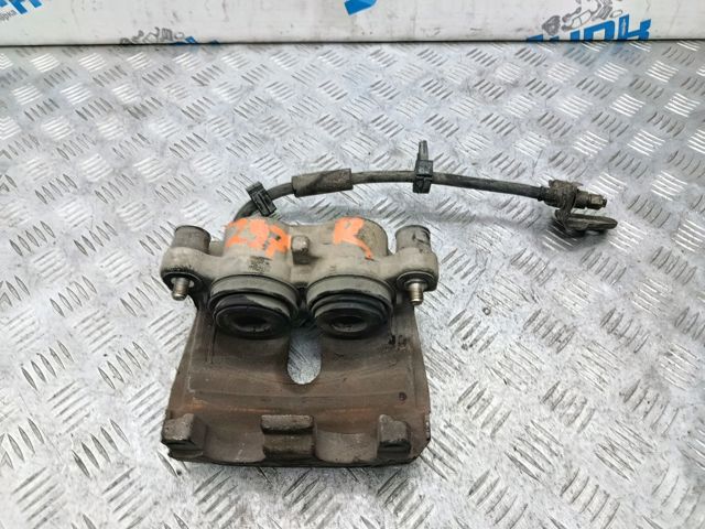 Суппорт тормозной, передний, правый R8052362AB CHRYSLER