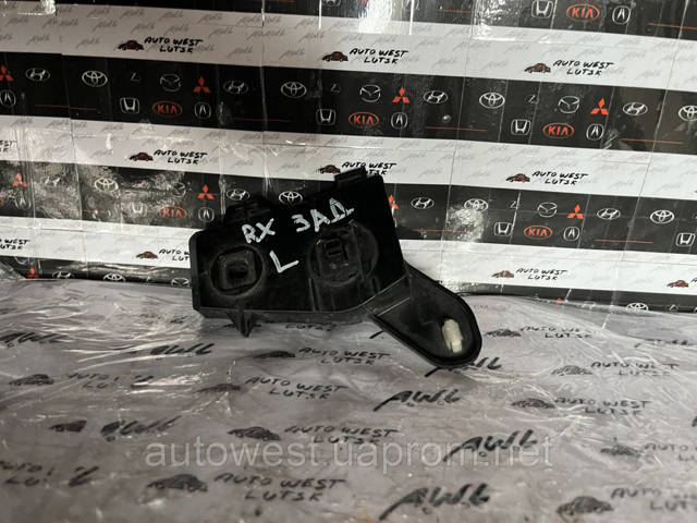 Кронштейн бампера заднего, левый 521560E011 TOYOTA